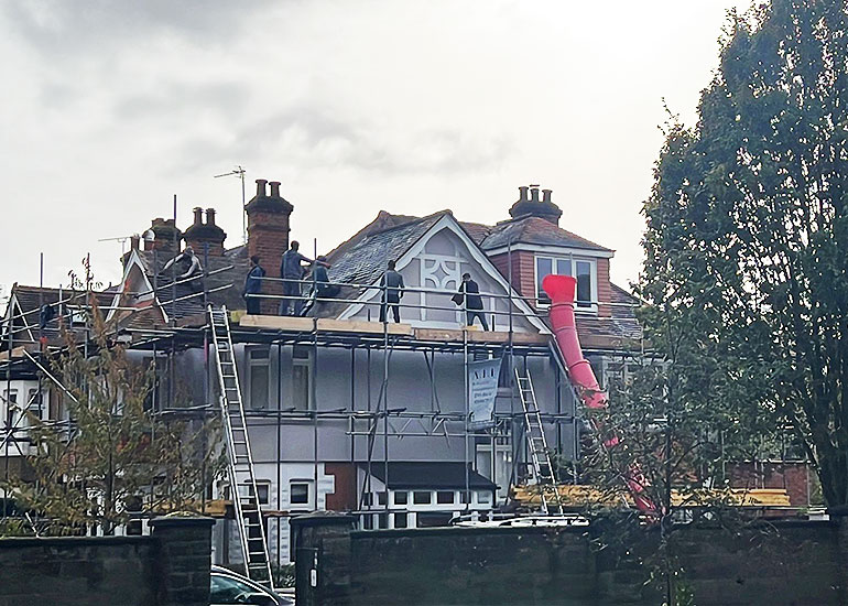 Roof maintenance work underway